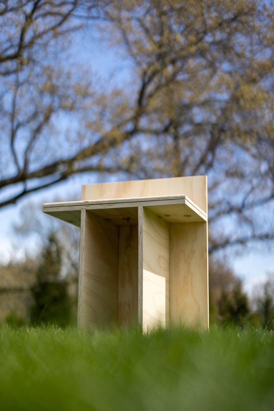 T.01 Axis Chair viewed low from the front with open leg voids